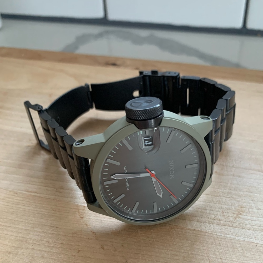 Nixon Chronicle wristwatch. Used , needs a new battery, no scratches or flaws .